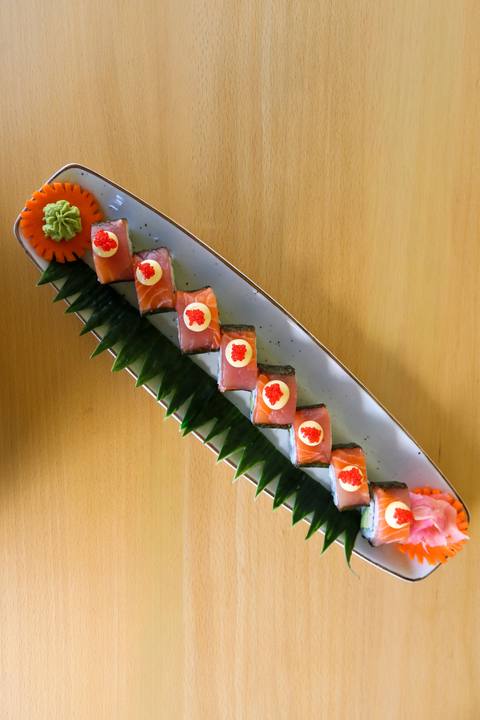 A sushi platter on a wooden table